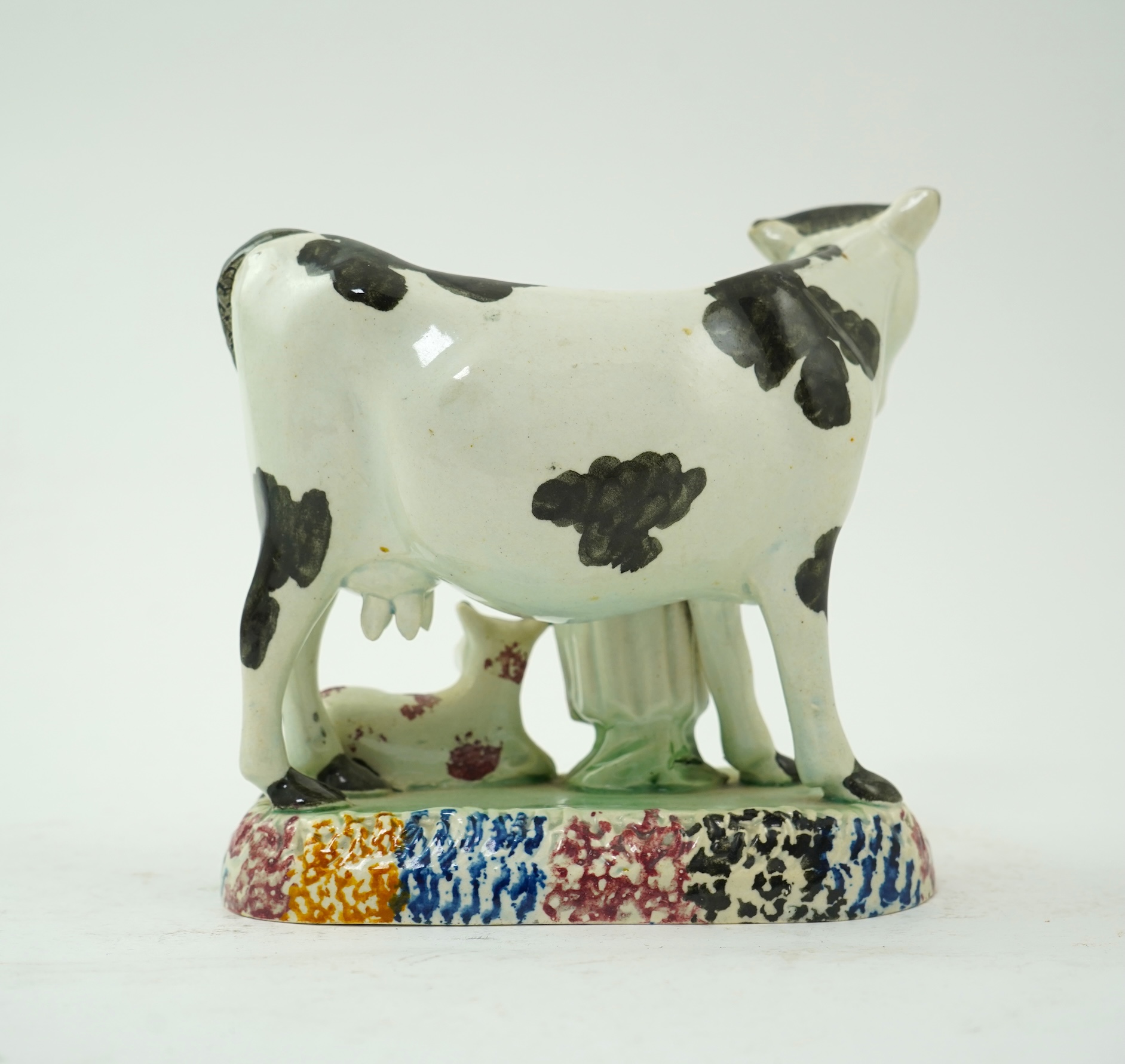 A James Emery, Mexborough pearlware cow, calf and milkmaid group, c.1820